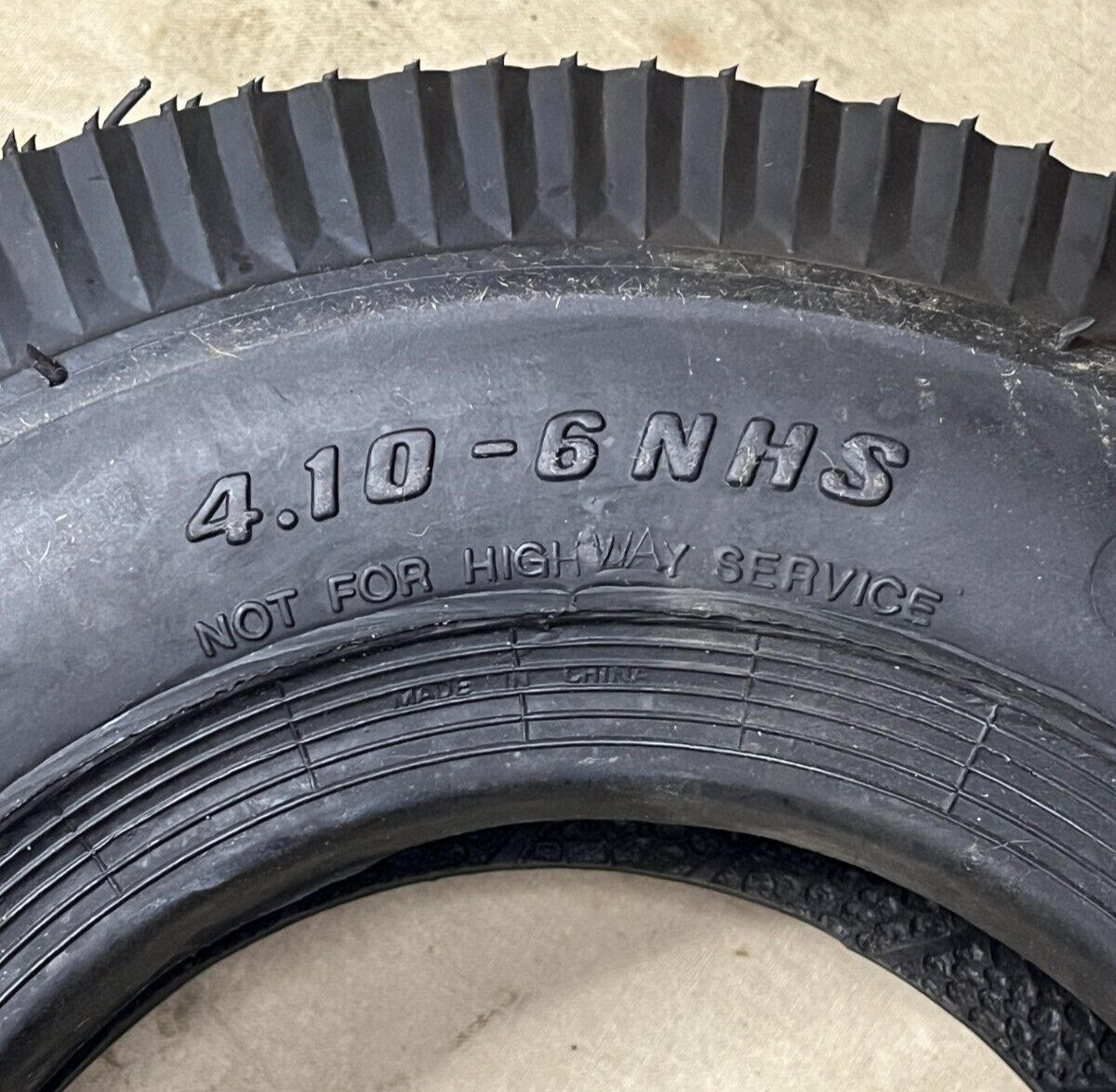 GENUINE CARLISLE SAWTOOTH RIB (NHS) 4.10-6 4 PLY YARD - LAWN TIRE 5190361