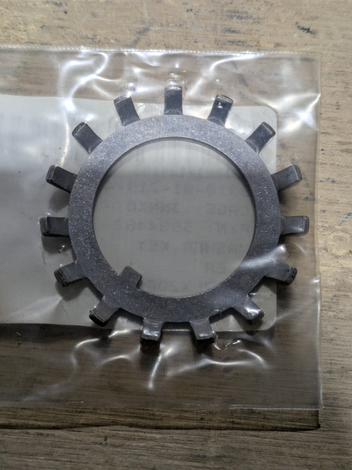 AM General LLC 5584462 Key Washer - NSN 5310-01-213-4185 - photo 1