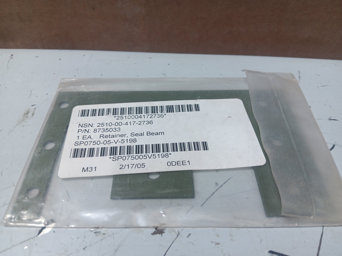 Beam Seal Retainer 8735033 - NSN 2510-00-417-2736 - inventory label