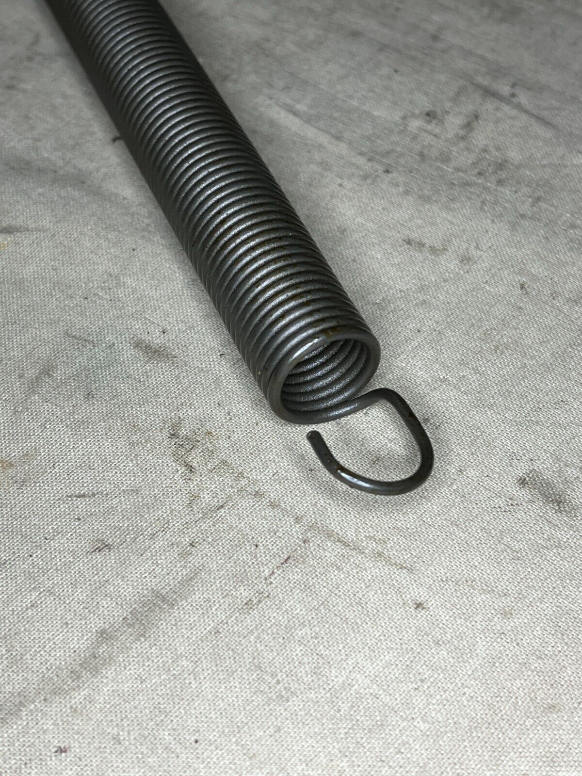 M939 M-916A1, M-915 SERIES 10938295 EXTENSION HELICAL SPRING 5360-00-941-8684