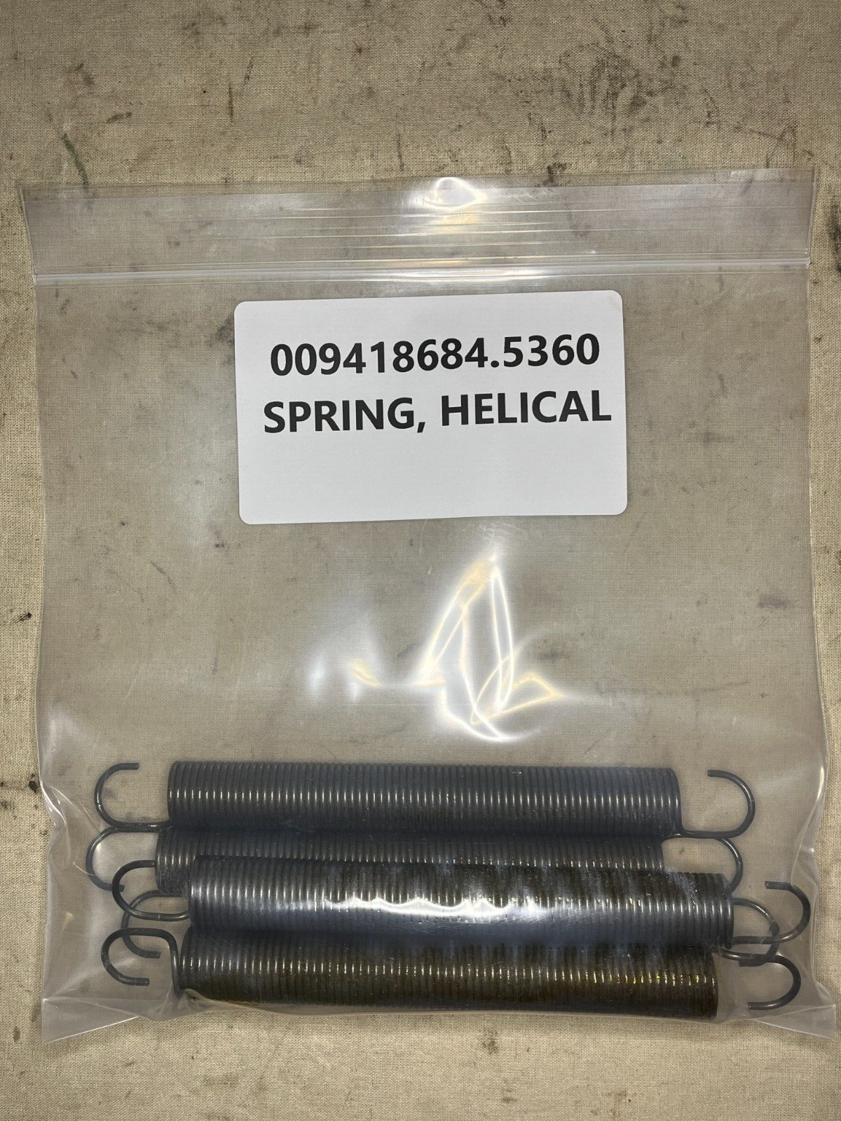 M939 M-916A1, M-915 SERIES 10938295 EXTENSION HELICAL SPRING 5360-00-941-8684