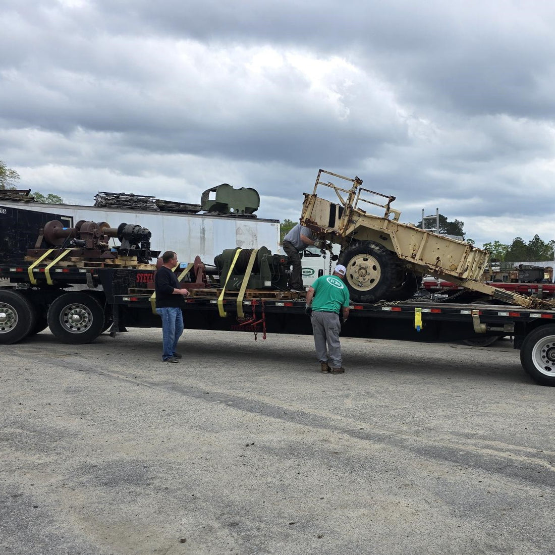 Trailer-mounted recovery winches loaded for transport.