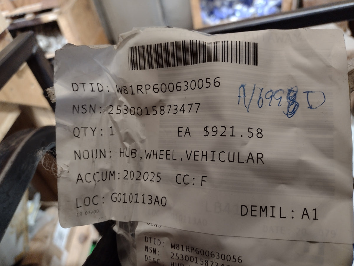 Oshkosh Defense LLC 3869157 Wheel Hub - NSN 2530-01-587-3477 - inventory label