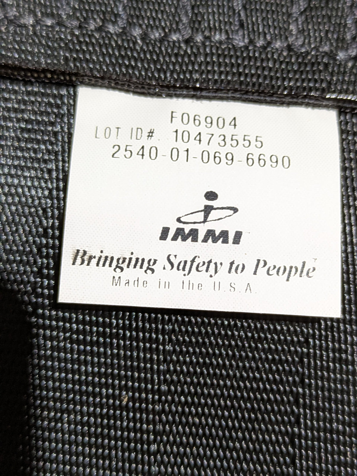 CNH Industrial America LLC 870888 Vehicular Safety Belt - NSN 2540-01-069-6690 - inventory label