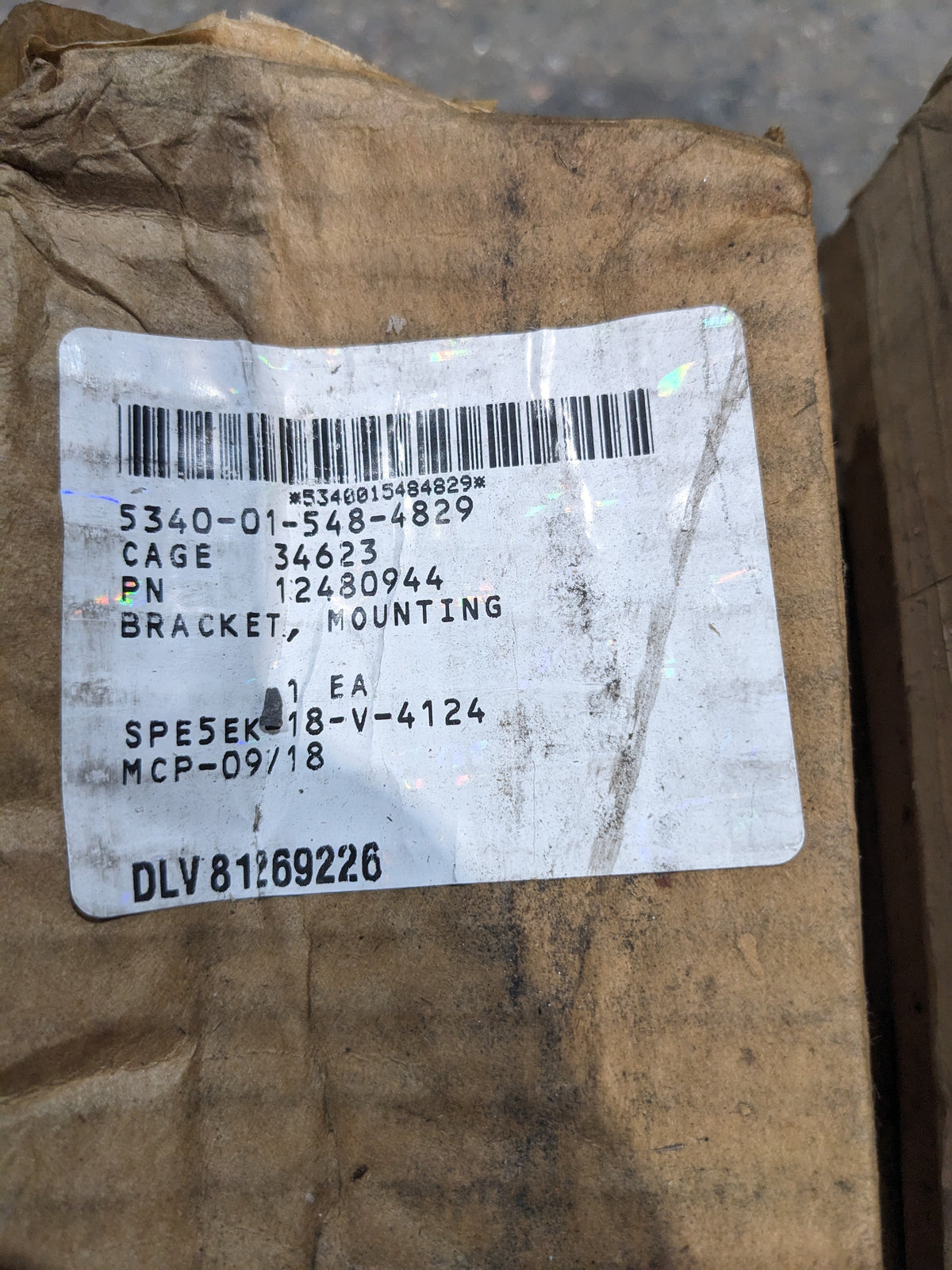 AM General LLC 12480944 Mounting Bracket - NSN 5340-01-548-4829 - inventory label